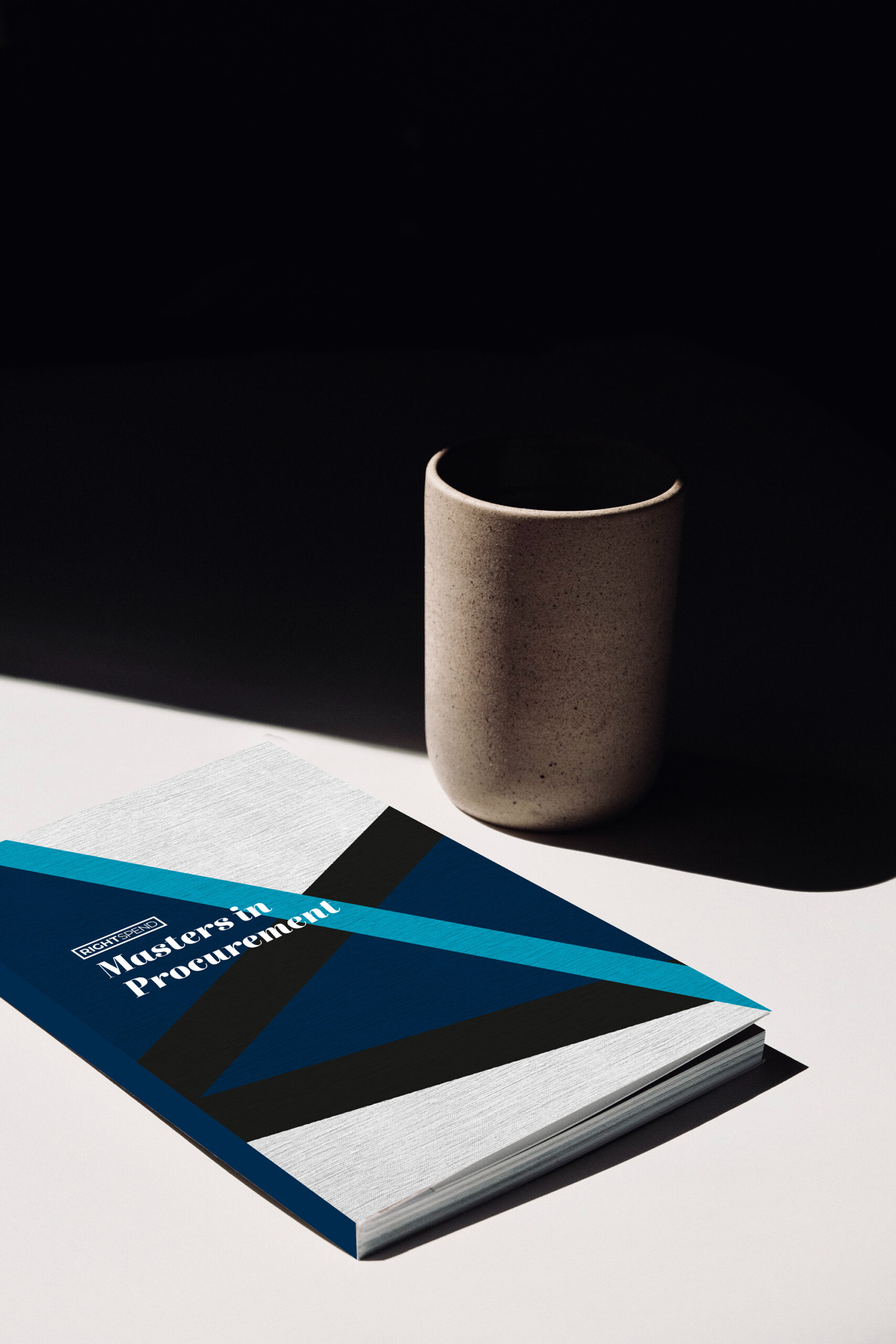 Masters In Procurement book laying on a desk