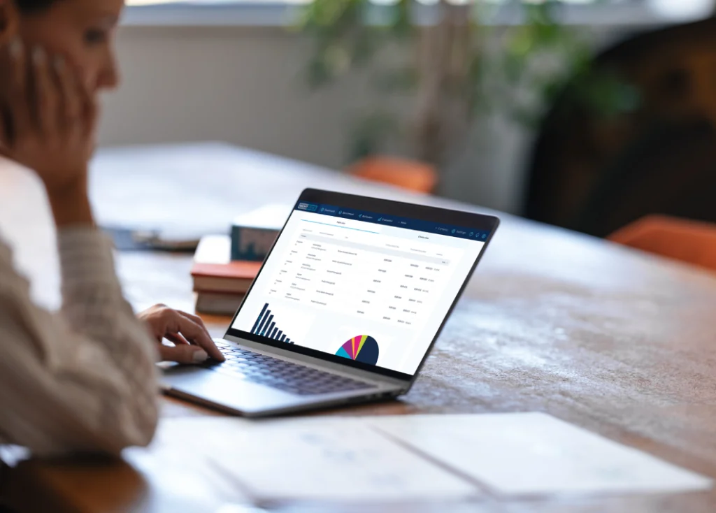 Laptop screen open with RightSpend to identify Marketing Procurement efficiencies