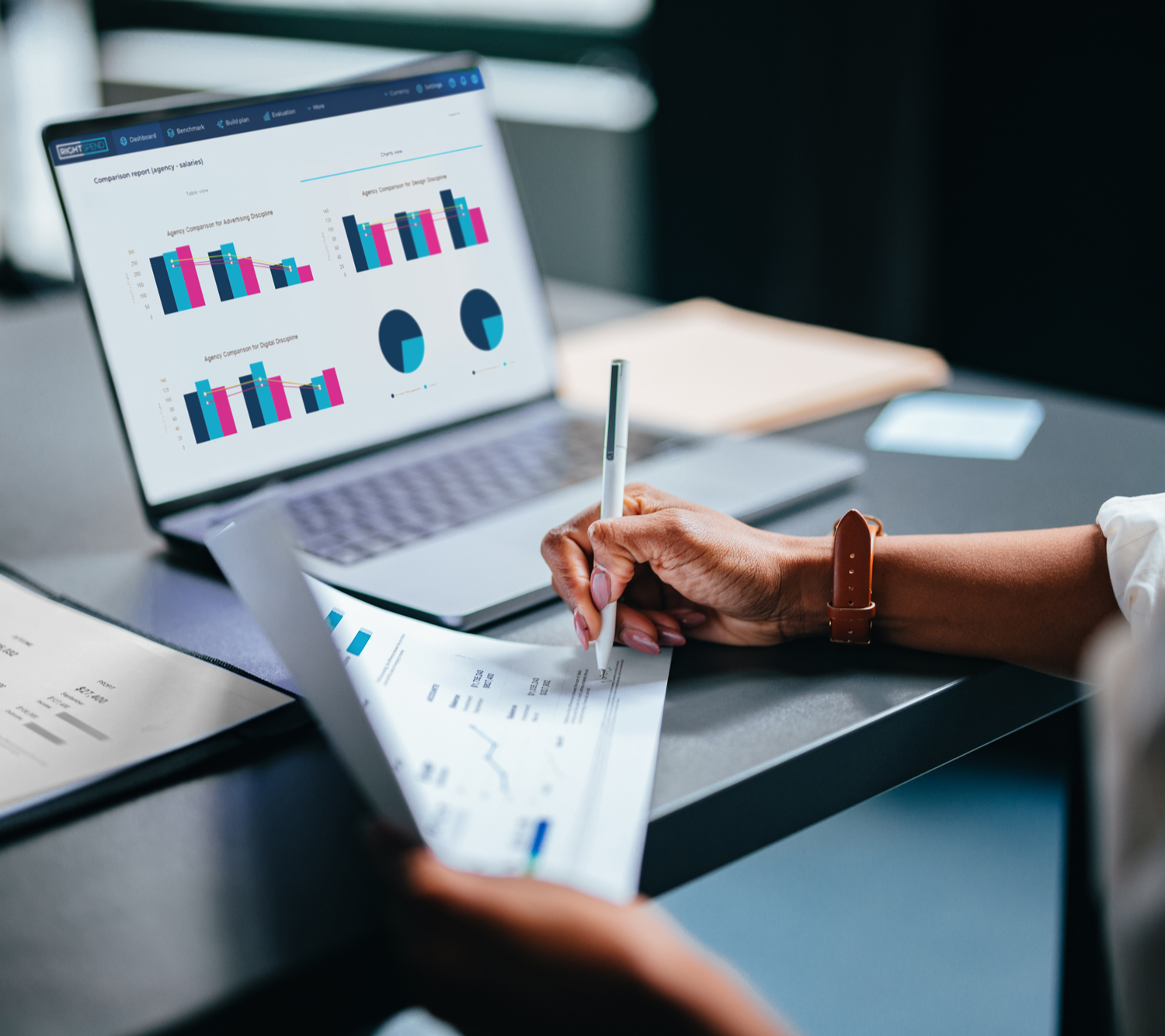 Hands and laptop to show the Marketing Investment that has been powered by RightSpend Data