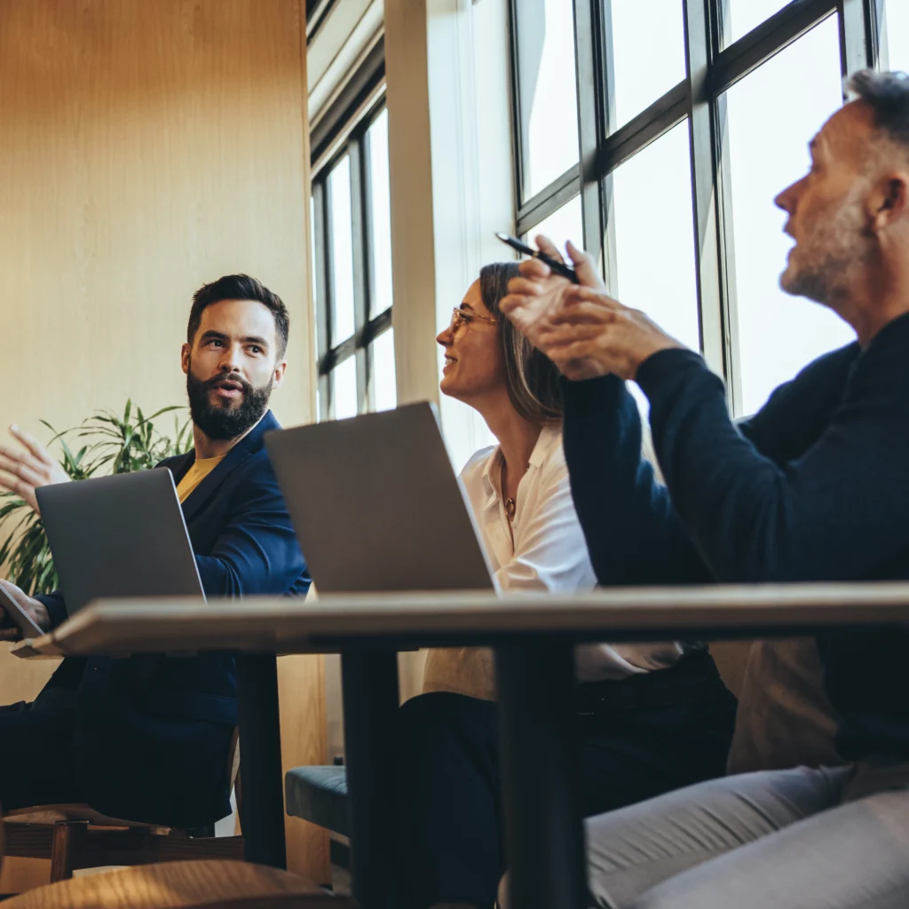 Marketing Procurement team discussing the benefits of using marketing procurement data to benchmark and track their agencies