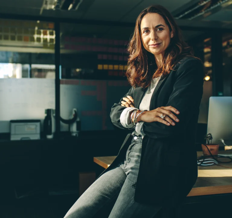 CPO sat on the edge of a desk looking to camera