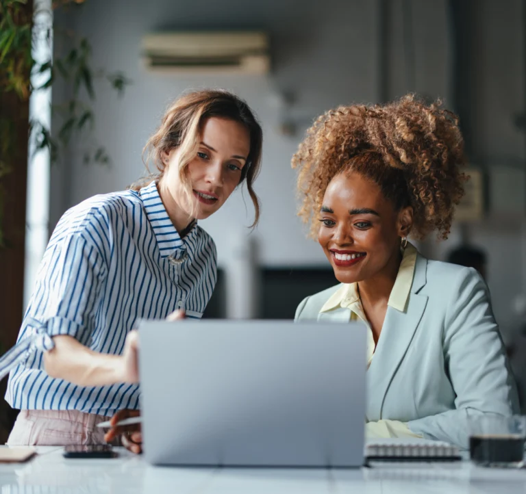 Procurement showing Marketing the benefits of the RightSpend system on a laptop