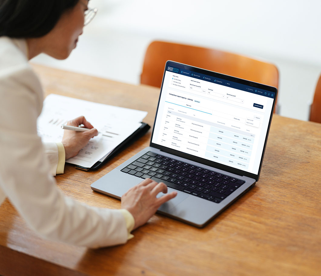 Marketing Procurement professional using the RightSpend system on a laptop to review her agency fees